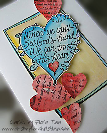 A Christian greeting card with cutout hearts to share about the love of God.